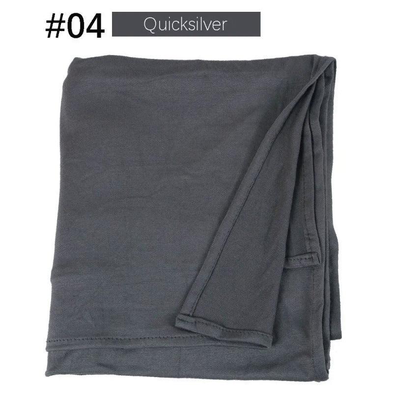 Graphite grey rectangular hijab folded on a white background.